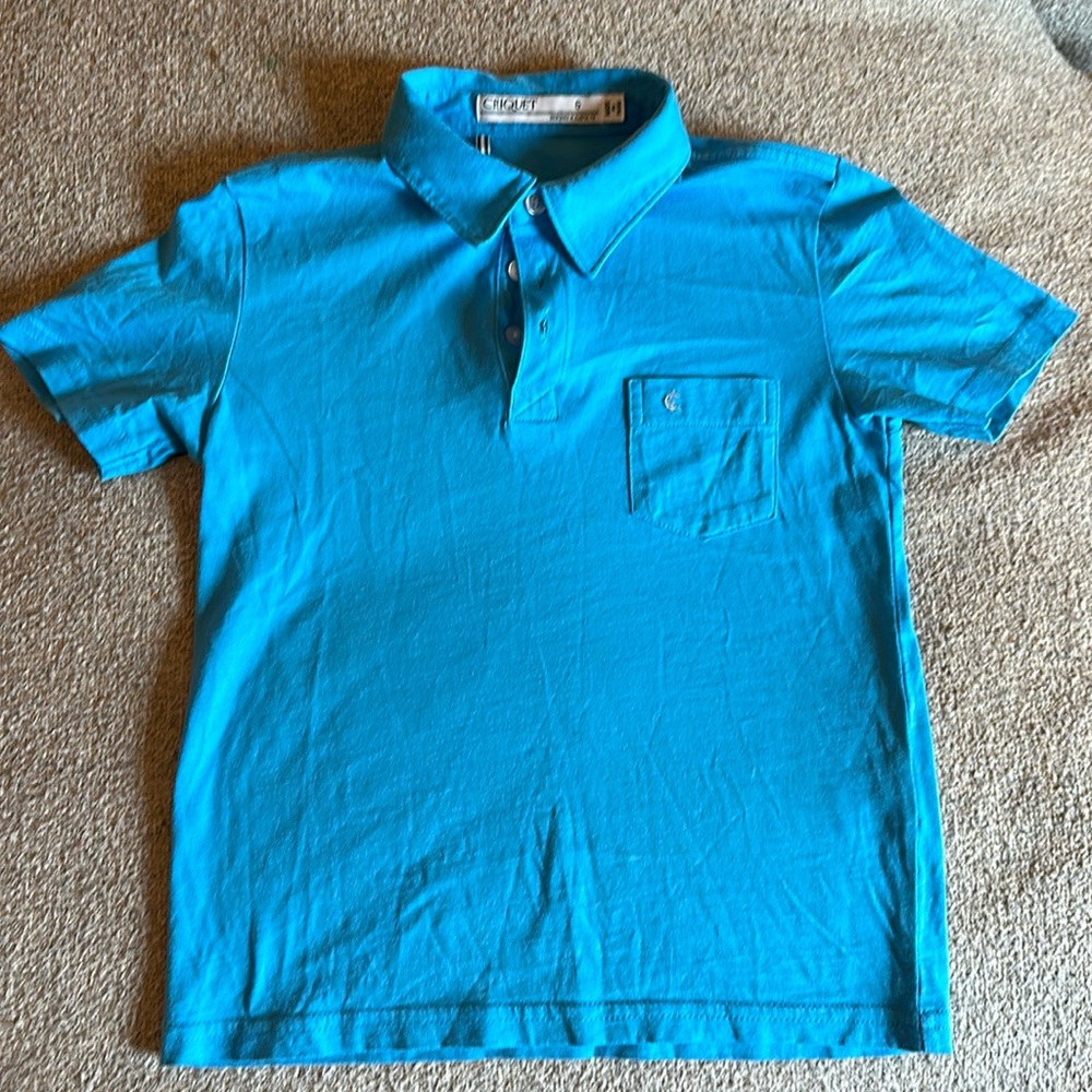 Like new size 6 Criquet Polo- blue